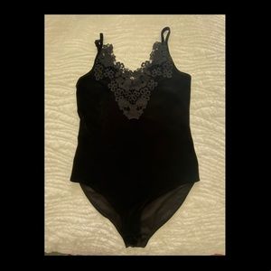 Black velvet body suit with lace v-neck